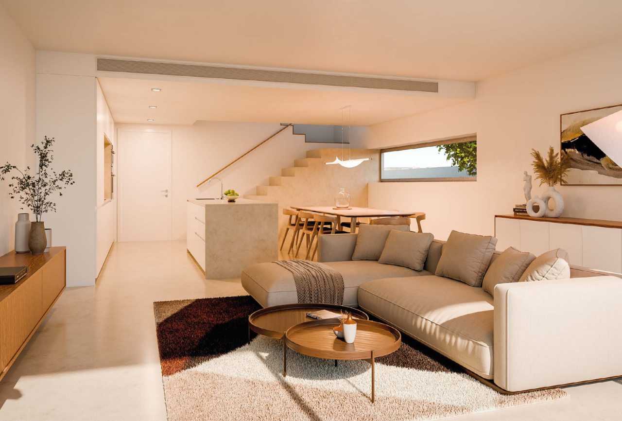 Interior de sala de estar com design contemporâneo e luz natural - Moradias Barra, Aveiro