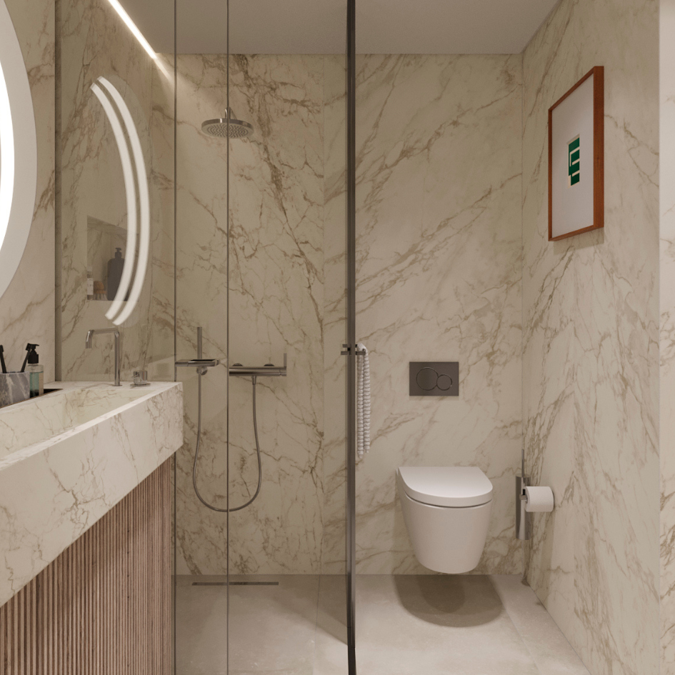 Casa de banho moderna com revestimento em mármore e acabamentos premium em apartamento de luxo em Aveiro